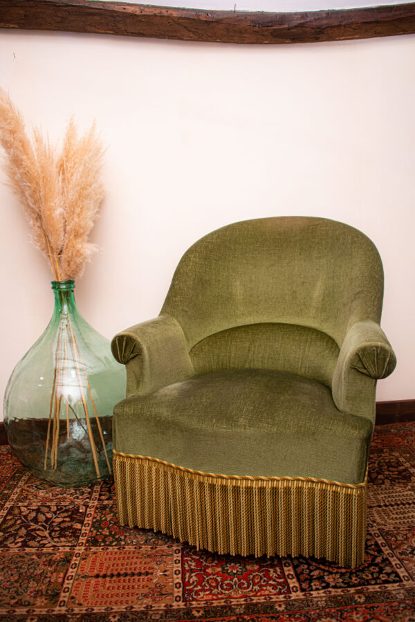 Fauteuil velours à franges